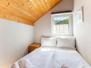 Ein Bett oder Betten in einem Zimmer der Unterkunft Apartment Veiderfeld by Interhome
