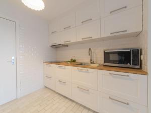 Kuchyň nebo kuchyňský kout v ubytování Apartment Seaview 2 by Interhome