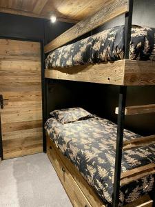 Двухъярусная кровать или двухъярусные кровати в номере Chamallow - appart 4-6 places rénové - cosy et confort !