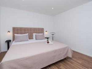 Ein Bett oder Betten in einem Zimmer der Unterkunft Holiday Home Villa Loreta by Interhome