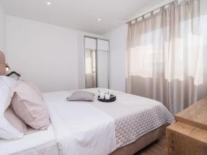 Ein Bett oder Betten in einem Zimmer der Unterkunft Holiday Home Villa Loreta by Interhome