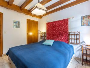 En eller flere senge i et værelse på Holiday Home Marguerite by Interhome + 12 billeder