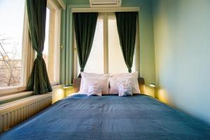 Posteľ alebo postele v izbe v ubytovaní Small Paris
