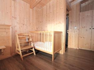 Posteľ alebo postele v izbe v ubytovaní Chalet Chalet Elisabeth by Interhome