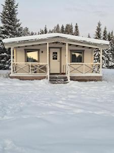 Aurora River Camp Glass igloos & cabins v zimě