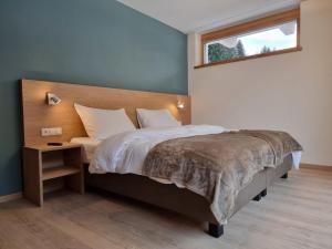 Postel nebo postele na pokoji v ubytování Apartment Bergschnucke Homes-2 by Interhome + 14 fotografií