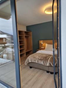 Postel nebo postele na pokoji v ubytování Apartment Bergschnucke Homes-2 by Interhome