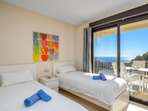 Posteľ alebo postele v izbe v ubytovaní Apartment Cielo y mar Samara by Interhome