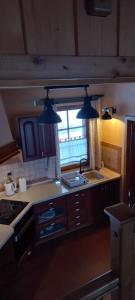 Kuchyň nebo kuchyňský kout v ubytování Apartmaji Pri Handelčanih, Zreče