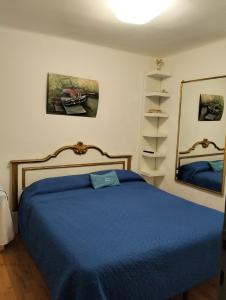 Posteľ alebo postele v izbe v ubytovaní ControVento Apartament II