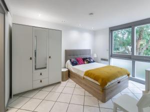 Posteľ alebo postele v izbe v ubytovaní Apartment L'Airial-3 by Interhome