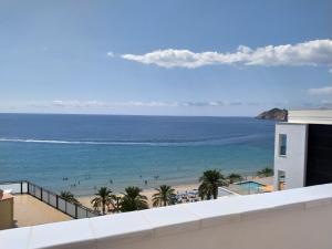 a view of the beach from the balcony at Apartment Suecia by Interhome in Benidorm