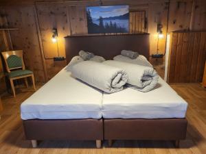 A bed or beds in a room at Holiday Home Stark by Interhome