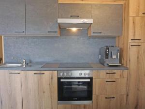 A kitchen or kitchenette at Apartment Apart Handle by Interhome