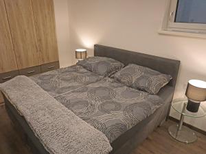 A bed or beds in a room at Apartment Apart Handle by Interhome