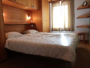 Postel nebo postele na pokoji v ubytování Apartment Ryad C by Interhome