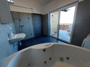 A bathroom at Chalet Diamondsky by Interhome