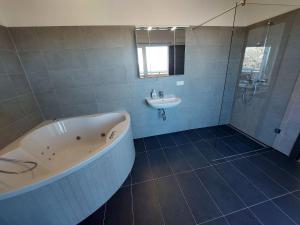 A bathroom at Chalet Diamondsky by Interhome