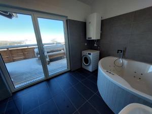 A bathroom at Chalet Diamondsky by Interhome