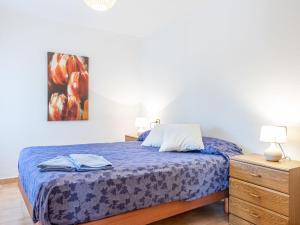 Postel nebo postele na pokoji v ubytování Holiday Home Tordera by Interhome