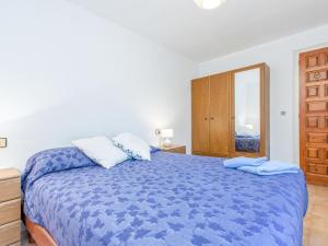 Postel nebo postele na pokoji v ubytování Holiday Home Tordera by Interhome