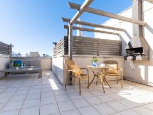 A balcony or terrace at Apartment Tamara by Interhome