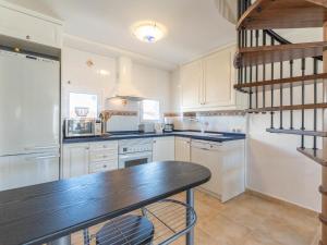 A kitchen or kitchenette at Apartment Tamara by Interhome Még 23 kép