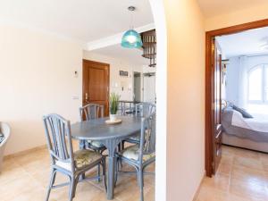 A bed or beds in a room at Apartment Tamara by Interhome
