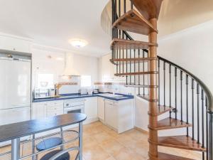 A kitchen or kitchenette at Apartment Tamara by Interhome