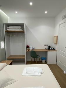 Postel nebo postele na pokoji v ubytování B&B MoMi Sorrento