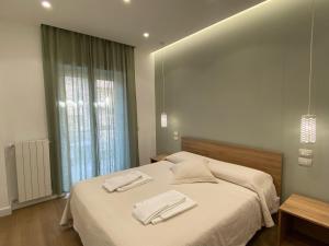 Postel nebo postele na pokoji v ubytování B&B MoMi Sorrento
