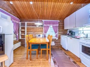 A kitchen or kitchenette at Holiday Home Hovimartti by Interhome