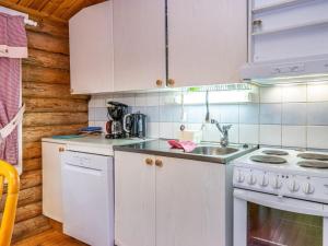 A kitchen or kitchenette at Holiday Home Hovimartti by Interhome