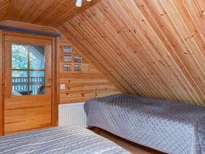 Postel nebo postele na pokoji v ubytování Holiday Home Pikku pyhis by Interhome