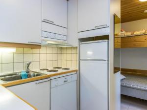 Kuchyň nebo kuchyňský kout v ubytování Holiday Home Lapintatti a by Interhome