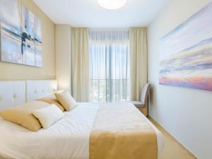 Postel nebo postele na pokoji v ubytování Apartment Ciudad Jardin-1 by Interhome
