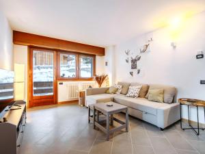 Posezení v ubytování Apartment Appartamento 29 by Interhome + 23 fotografií