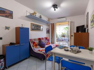a living room with a couch and a table at Apartment Acqua marina by Interhome in Sanremo