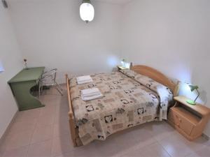 Postel nebo postele na pokoji v ubytování Apartment Anna by Interhome