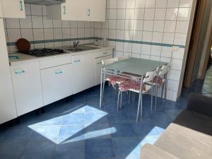 Kuchyň nebo kuchyňský kout v ubytování Casa Vacanza Carmen