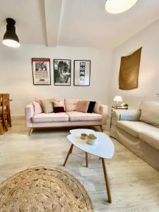 a living room with a couch and a table at Apartamento Cartagena centro in Cartagena +36 photos