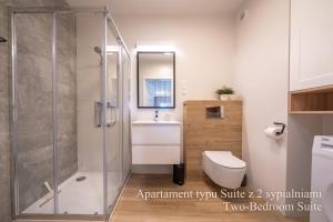 Vannas istaba naktsmītnē RentPlanet - Apartamenty IzerSKI Resort