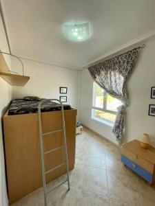 A kitchen or kitchenette at Apartamento vacacional Urb. Nerea II REF. 065