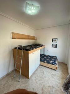 A kitchen or kitchenette at Apartamento vacacional Urb. Nerea II REF. 065