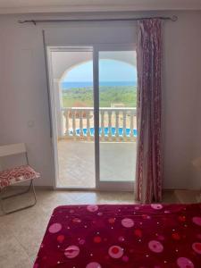 A bed or beds in a room at Apartamento vacacional Urb. Nerea II REF. 065