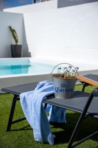 a bucket of utensils sitting on a table at Villa Casilla de Costa Private Pool Luxury La Oliva By Holidays Home in La Oliva