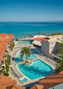 an aerial view of a resort with a swimming pool at Tsilivi Beach Hotel Zakynthos in Tsilivi