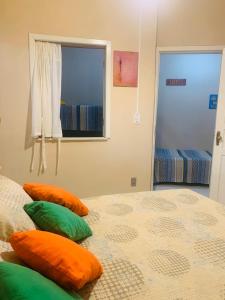 Una cama o camas en una habitación de Vila das Estrelas - Guesthouse