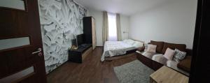 Postel nebo postele na pokoji v ubytování Olomouc New3