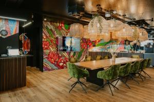 Rioca Neu-Ulm Posto 5餐厅或其他用餐的地方